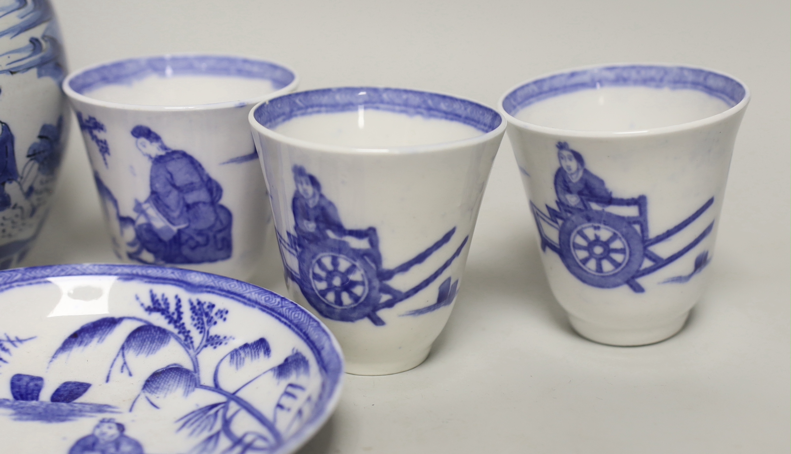 A late 17th century Delft blue and white ewer and three Chinese style tumblers and saucers, tallest 20cm